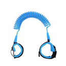 The Child Safety Wristband features a blue coiled safety tether with an anti-slip Velcro design, adjustable wristbands, 360-degree free rotation, a flexible cord, and padded black and blue material for secure comfort.