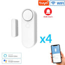 A Smart Home Door And Window Sensing Alarm, shown in white, integrates with smartphones and works with Alexa, Google Assistant, and WiFi. The image displays the device, app interface, compatibility icons, and a 90dB alarm. Includes 4 units.