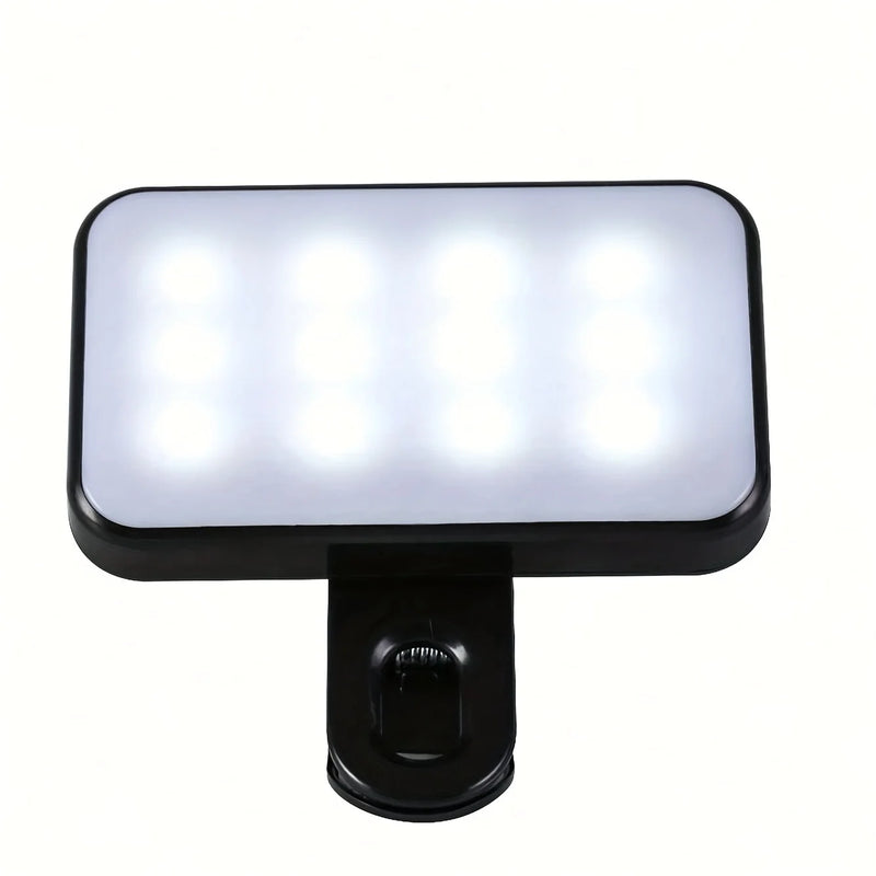 The Mini Selfie Fill Light features eight LED beads within a black ABS frame, offers three color modes with adjustable brightness, is rechargeable, and includes a mounting clip for phones or computers.