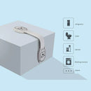 A silver Child safety lock is shown on a cube with illustrations indicating its use on a refrigerator, toilet, cabinet, and washing machine. The light blue background highlights its child-proof design.