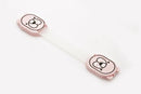 A charming child safety lock features pink bear designs at both ends linked by a flexible white strap. The child-proof lock lies flat against a plain white background, combining security and playful design.