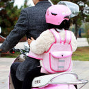 A child with a pink helmet and backpack uses the Child Safety Rope Motorcycle Child Safety Belt while holding an adult in a dark coat on a light pink motorcycle with Chinese characters. Trees and greenery are in the background.