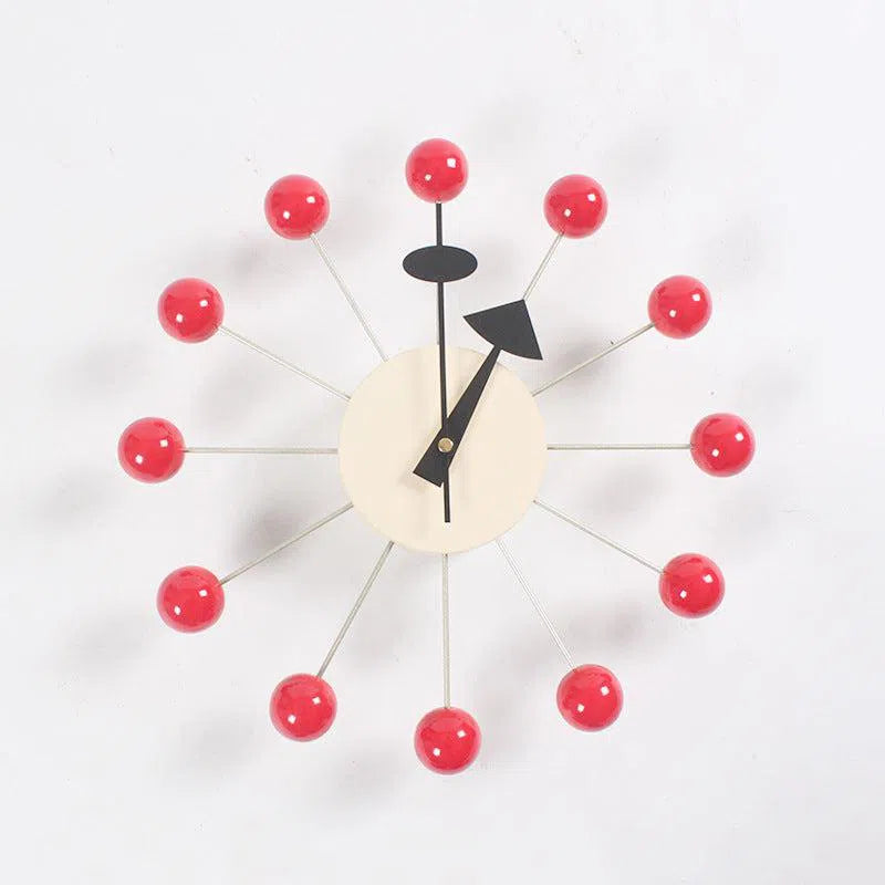 The Clock, background wall, wall clock boasts a minimalist European design with a beige face and black hands. Red spheres on slender rods at each hour create a molecular effect, adding an abstract touch to your interior decor.