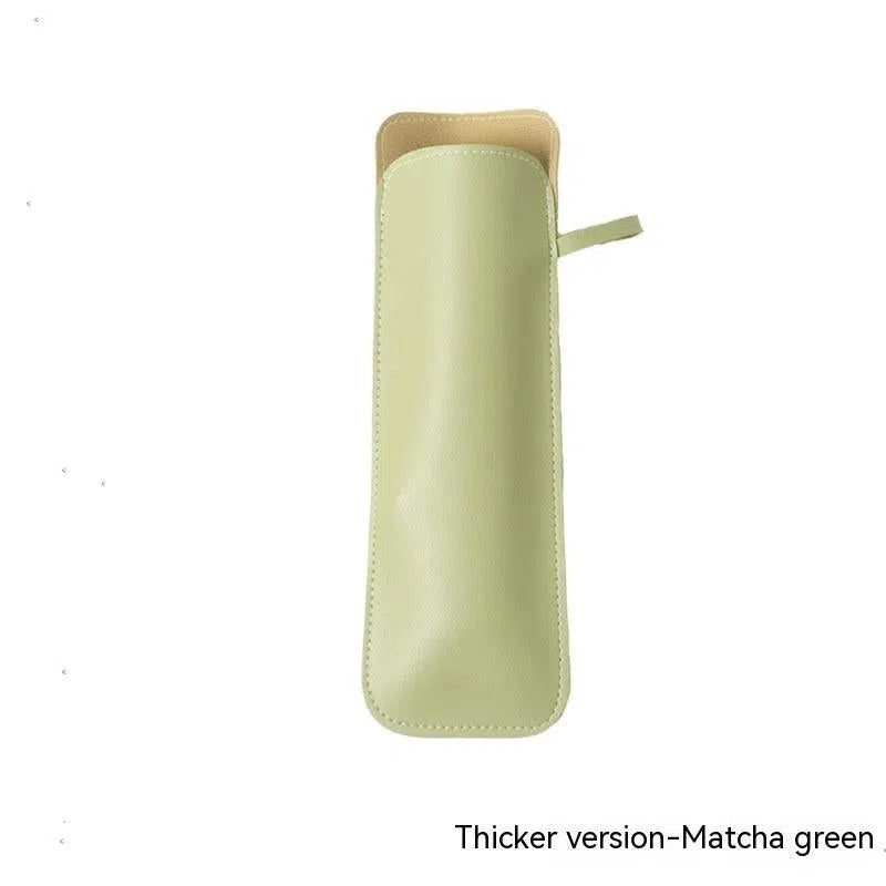 A rectangular pencil case in light green, crafted from high-quality polyester fiber with a zipper, is displayed vertically. The phrase Thicker version—Matcha green appears at the bottom right. Product: Color Self-opening Umbrella Color Matching Leather Case.