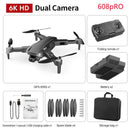 Image showcasing the 608pRO package with a 6K HD GPS High-definition Dual Camera drone for aerial photography. Comes with drone, folding remote, battery, screwdriver/manual/USB cable, four spare blades, and storage bag.