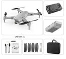 The GPS 608S x1 bundle includes a gray quadcopter drone with GPS high-definition dual camera, black remote control, battery, charging cable, six propeller blades, user manual, screws, and a sleek black carrying case—perfect for aerial photography enthusiasts.
