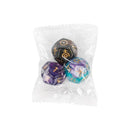 A clear plastic pouch holds three Innovative Fantasy Starry Sky Resin Multi-sided Game Dice: one is black with gold numbers, another is purple with white, and the third is a teal-purple blend with gold.