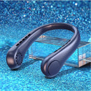 A sleek, dark blue Mini Neck Fan Portable Bladeless Hanging Neck Rechargeable Air Cooler sits on a clear stand. It features vent openings and a circular design at each end. The shimmering blue background highlights its allure, making this mini summer sports fan both stylish and functional.