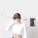 A person in a white long-sleeve crop top enjoys the New Eye Spa And Music Therapy with a black eye mask, smiling against a light gray backdrop. Musical notes and a smartphone app highlight the music therapy feature.
