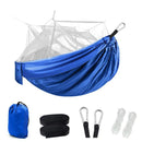 The Outdoor Camping Hammock With Mosquito Net is crafted from durable nylon, featuring an attached white mosquito net. It includes a carrying bag, two black straps, metal carabiners, and white ropes—perfect for your next adventure.