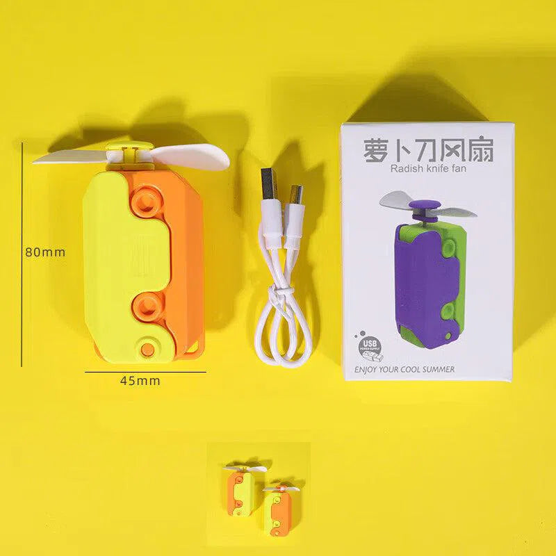 A compact USB fan labeled Radish Knife Mini-portable Handheld Fan features a yellow and orange casing, two white blades, and comes with a USB cable. Its displayed beside its packaging on a bright yellow background, with dimensions noted in annotations.