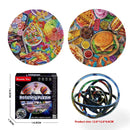The Rotating Puzzle Decompression 3D Educational Toys feature colorful food images like burgers and pancakes. They enhance fine motor skills for ages 3+. Packaged with a puzzle over a black sphere, the box, in black and red, details its features. Dimensions: 12.6*12.6*0.6 cm.