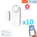 The Smart Home Door and Window Sensing Alarm includes ten units with a 90dB alarm, WiFi connectivity, and is compatible with Tuya, Amazon Alexa, and Google Assistant. Also shown is a smartphone running the smart home alarm app.