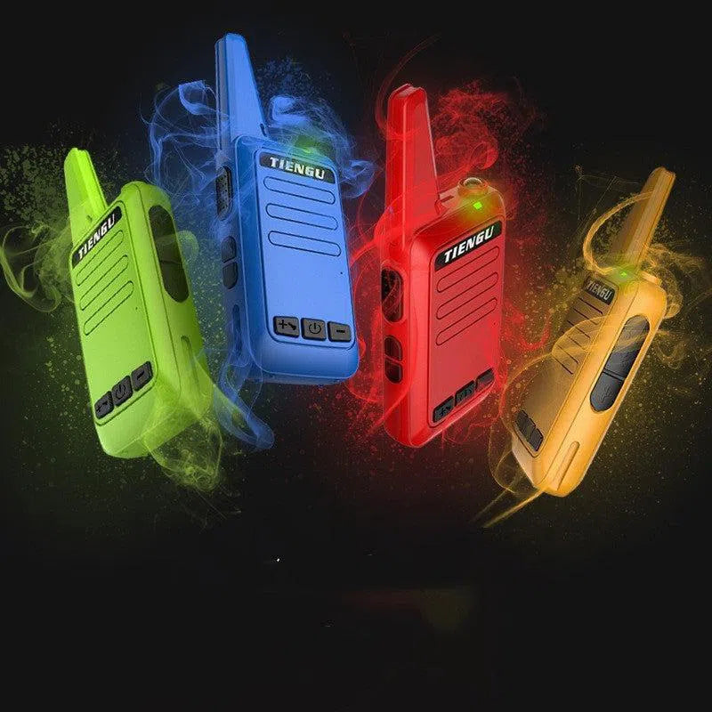 Four TIENGU Professional Wireless Handheld Intercom Radios—green, blue, red, and yellow—float against a black background. Each colorful device features an LED flashlight and visible buttons with a smoky, matching color trail following each radio.
