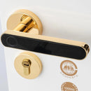 The Smart Door Lock Opens At A Touch features a golden smart handle with a black touchpad and matching gold keyhole. It offers cutting-edge biometric technology for fingerprint storage, ensuring added security. The door is modern and sleek, with a round safety certification sticker in the bottom right corner.